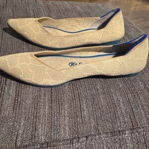 Rothy's The Point ballet flats in Sahara Gold giraffe print